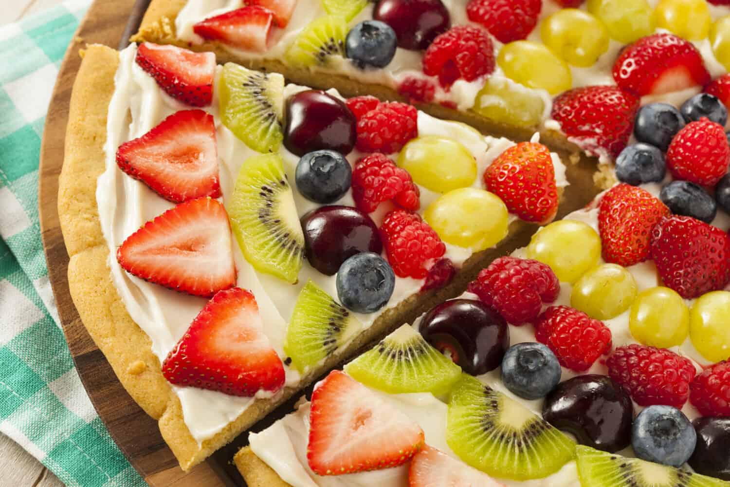 Homemade Natural Fruit Pizza with Frosting and Berries