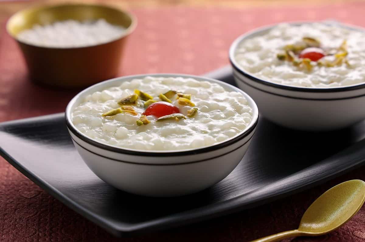 Sabudana Kheer thick pudding with tapioca pearls sago dessert from cassava root Indian sweet mithai chowari payasam for Mahashivratri Ram Navami Diwali festival.