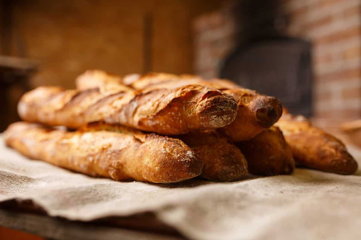 French organic baguettes bread in authentic bakery setting