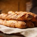 French organic baguettes bread in authentic bakery setting