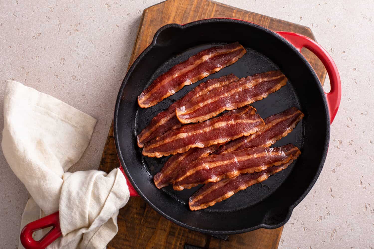 Turkey bacon cooked on a cast iron pan ready to eat