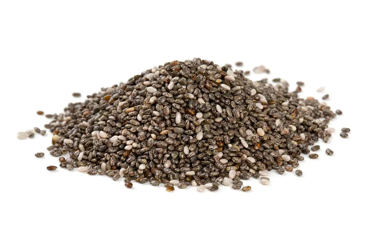 Chia seeds give nice nutty flavor to dishes.yougurts chia seeds isolated on white