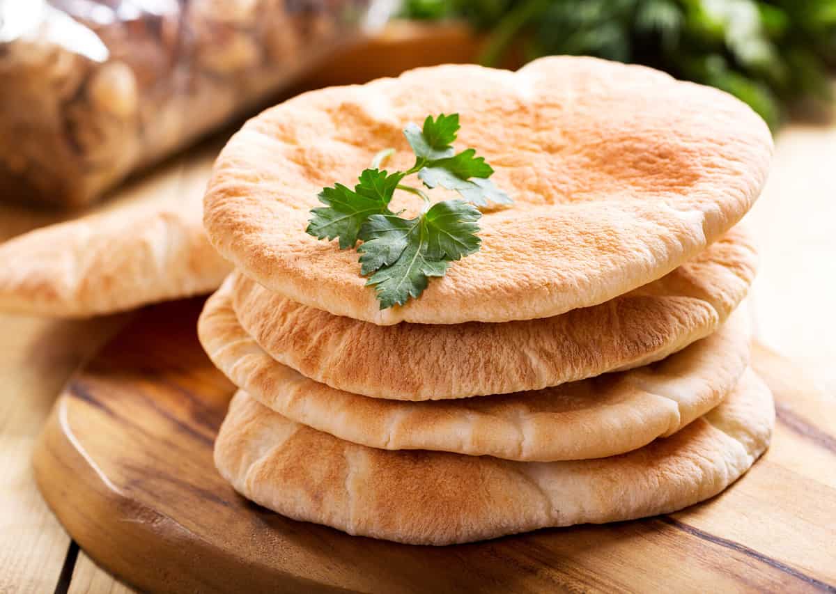 pita bread on wooden board