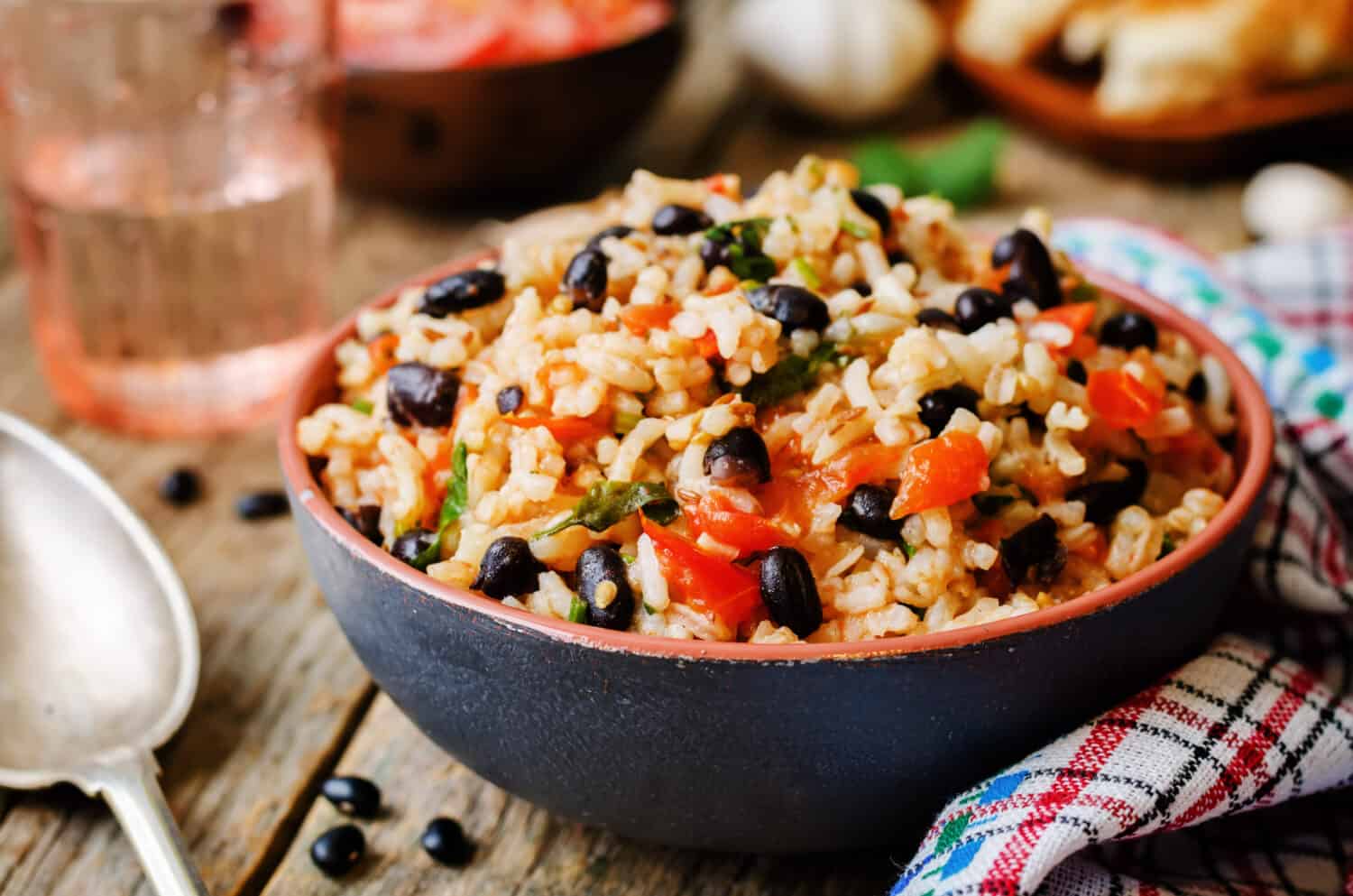 Mexican tomato black beans rice with cilantro. the toning. selective focus