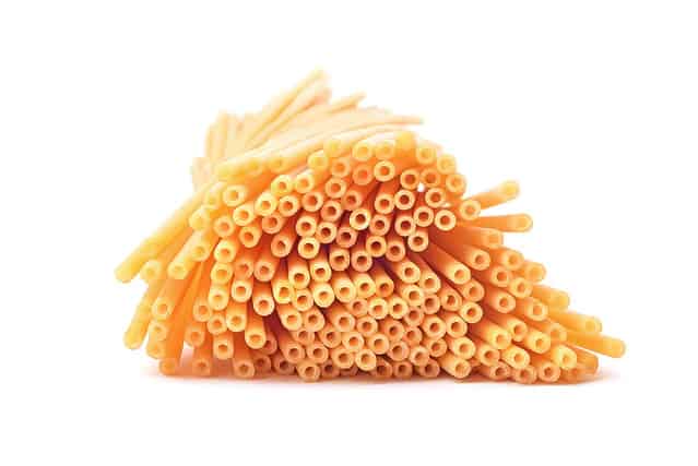 spaghetti bucatini pasta studio isolated