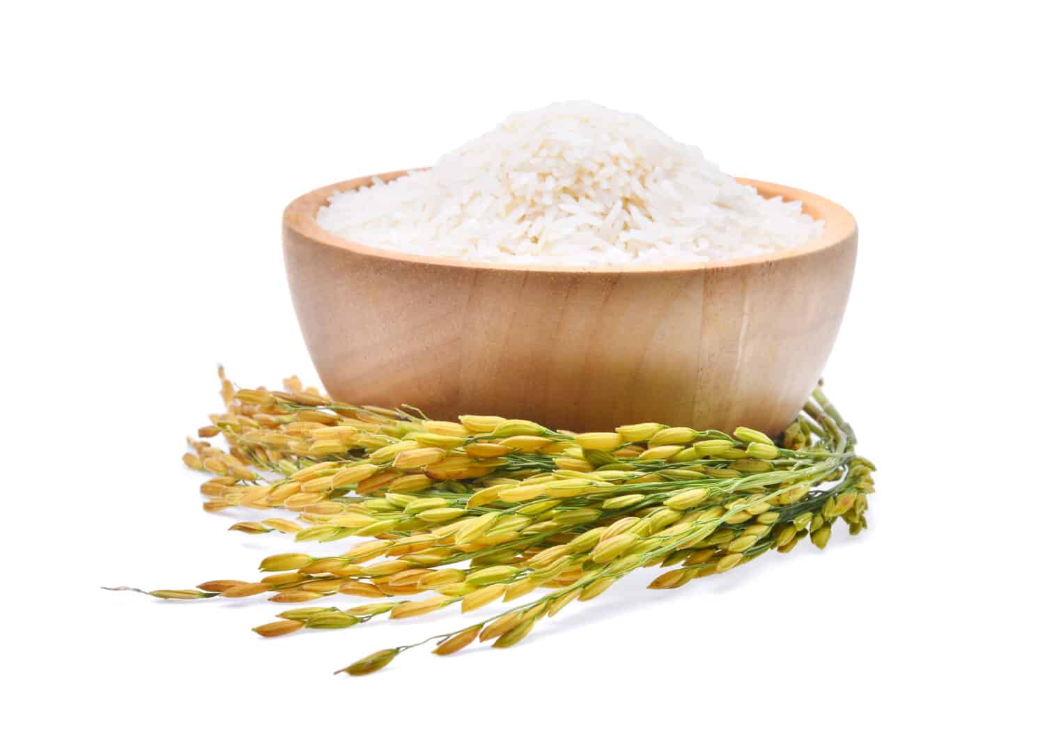 A wooden bowl filled with white rice.