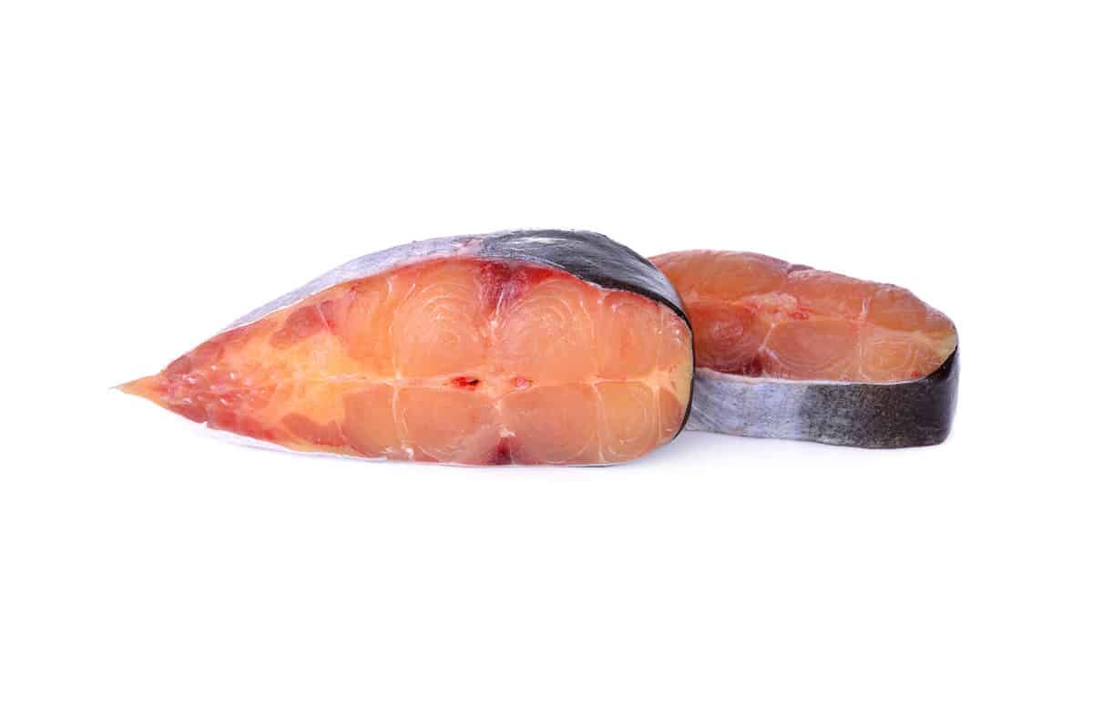 portion cut swai pangasius fish on white background