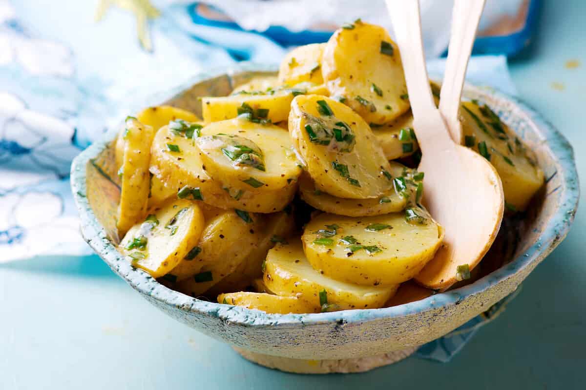 Hot Potato Salad with Scallion Vinaigrette. selective focus