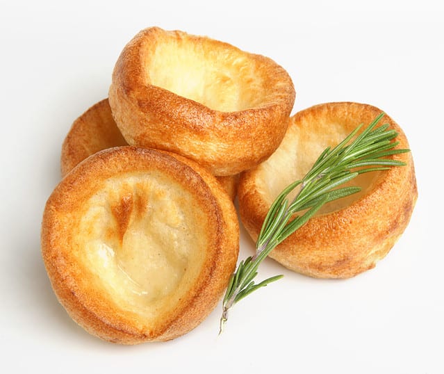 Yorkshire puddings with sprig of rosemary