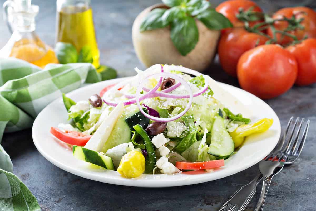 House salad with fresh vegetables picled pepper and feta cheese