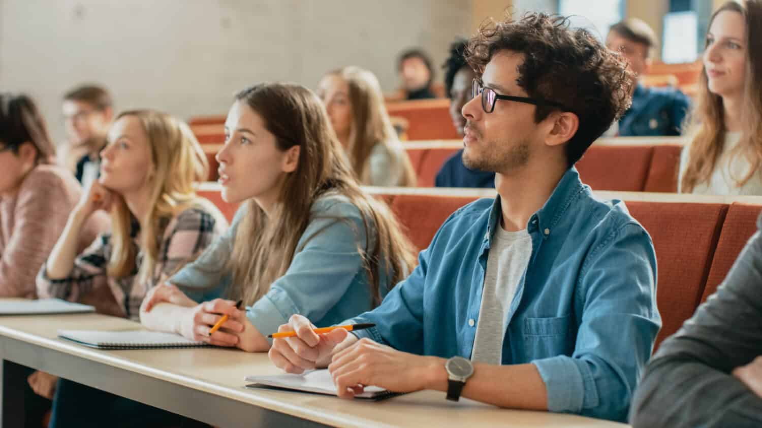 University students silently listening to a fascinating lecture.