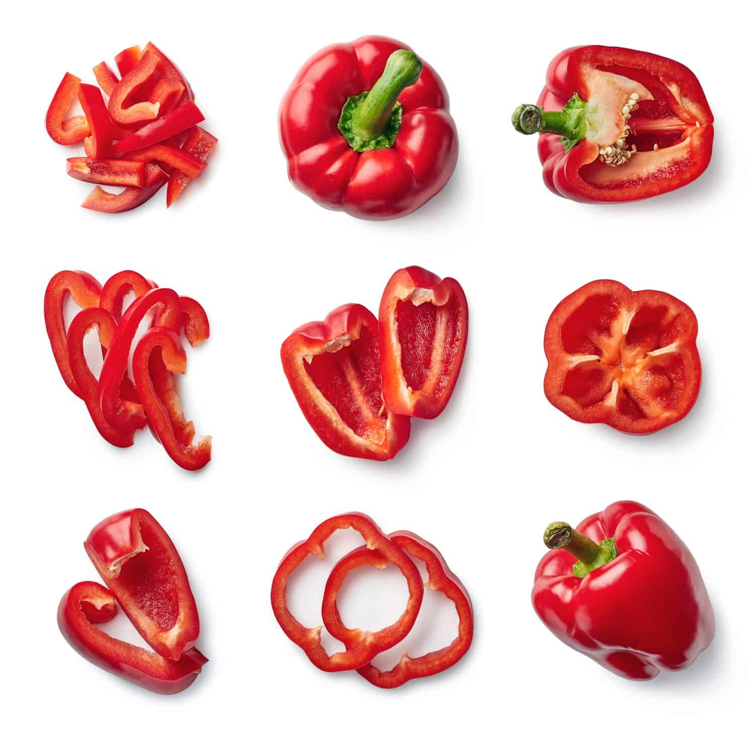 Set of fresh whole and sliced sweet red pepper isolated on white background. Top view