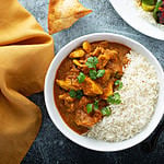 Chicken curry with jasmine rice, indian food concept