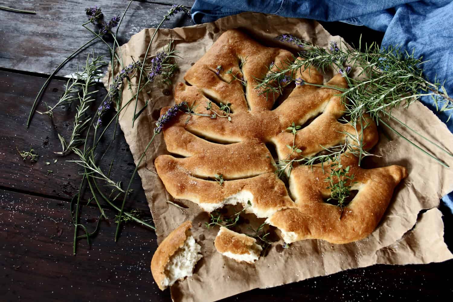 Fougasse, traditional french bread on wooden background