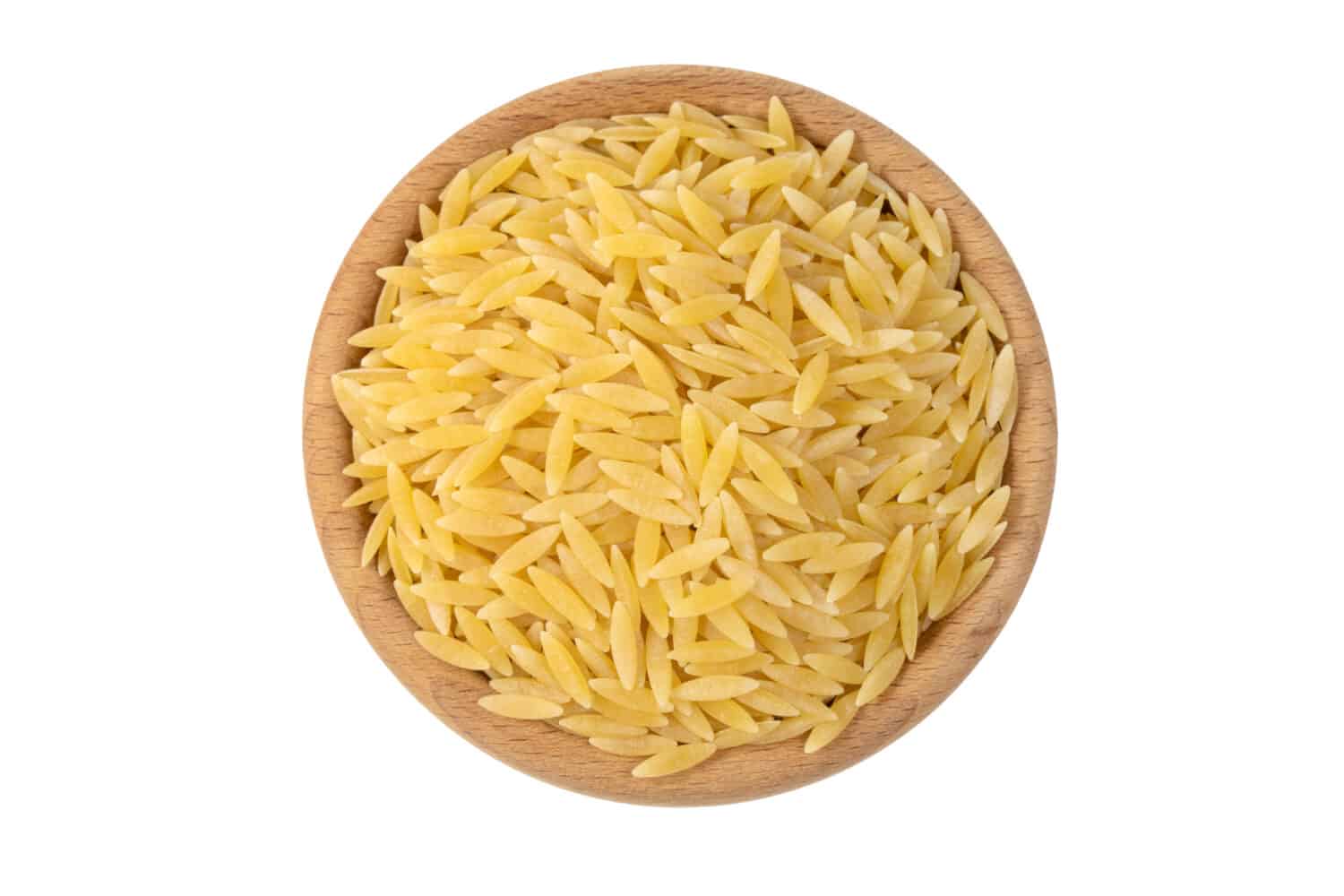 A close-up of Orzo, an Italian pasta shaped like a large grain of rice.