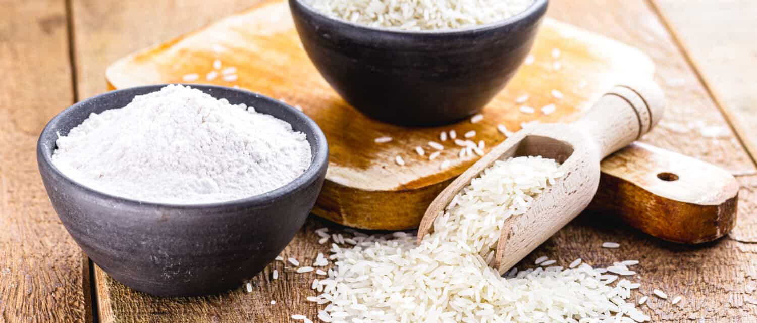 rice flour with raw rice pot on the side, culinary ingredient