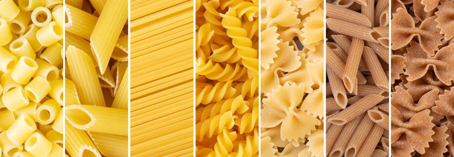 Collage of assorted pasta. Whole and regular uncooked pasta in panoramic format.