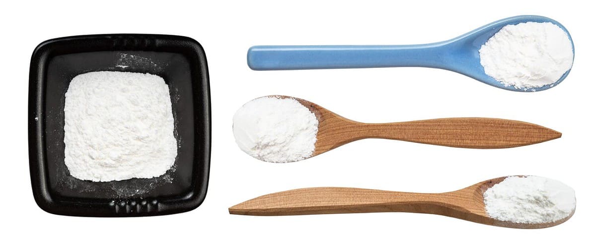 set of various baking powder isolated on white background