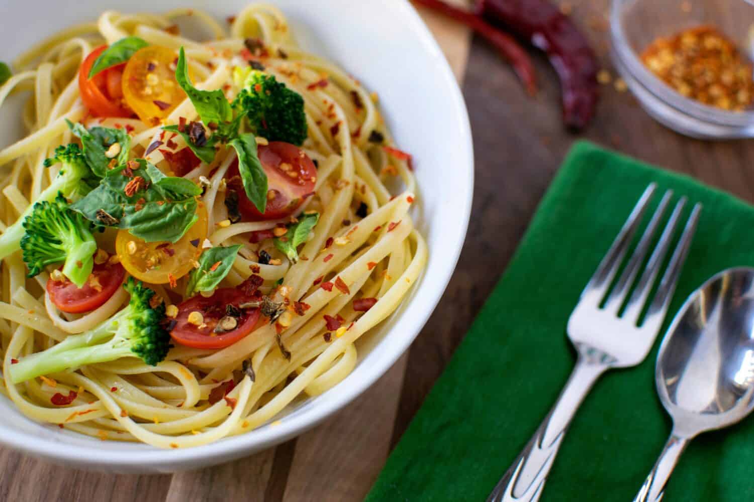 Vegetarian Pasta with Olive Oil, Broccoli, Basil, Cherry Tomatoes and Pepper Flakes