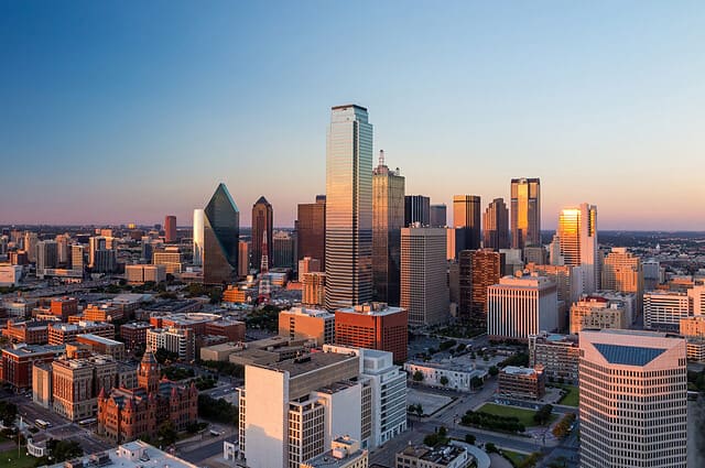 Dallas, Texas cityscape with blue sky at sunset, Texas