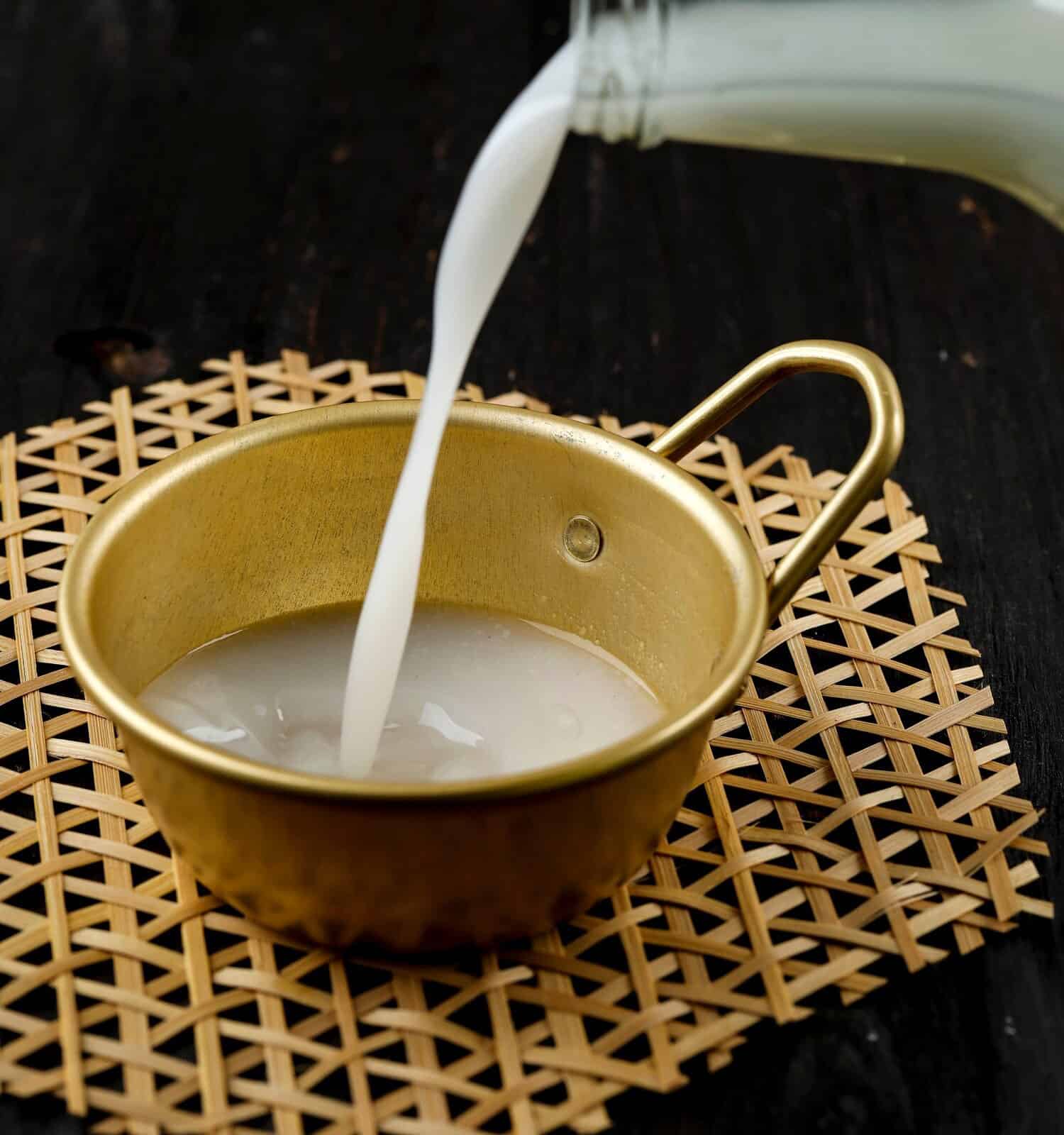 Pour Makgeolli, Korean Traditional Alcohol, Korean Rice Wine. Selected Focus