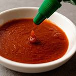 Sriracha with sweet and sour sauce