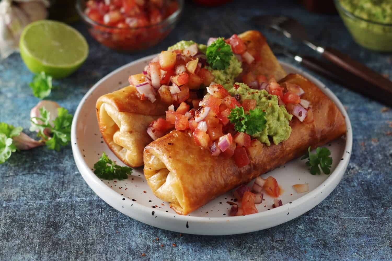 Chimichangas vs. Flautas: A typical dish of Mexican cuisine - Chimichanga, made of tortilla with different ingredients