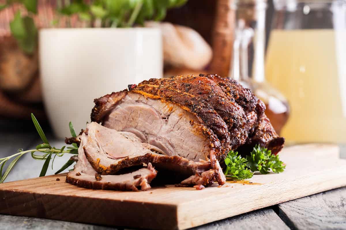 Roasted shoulder of pork on a cutting board