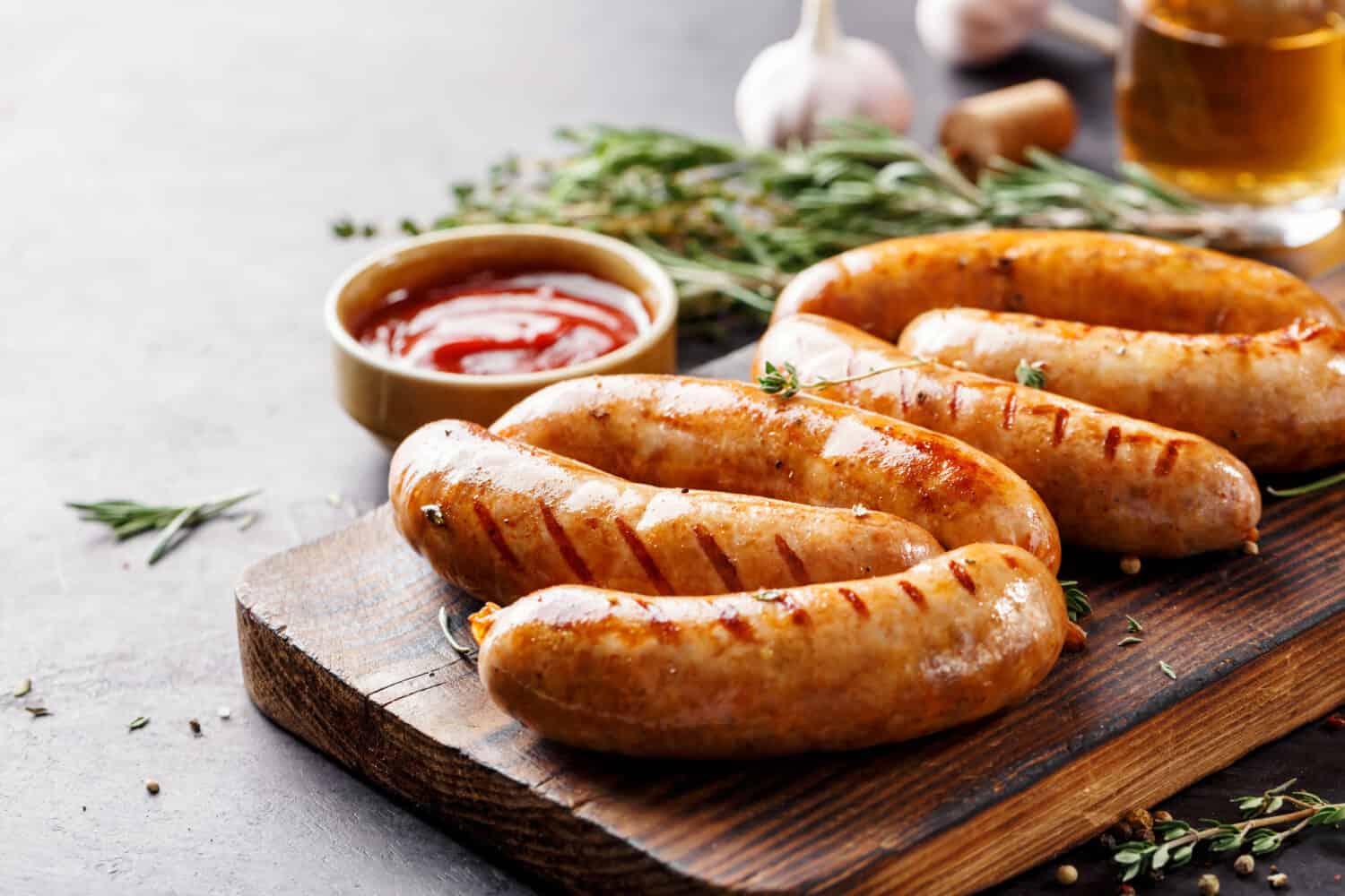 Sausages fried with spices and herbs, Selective focus