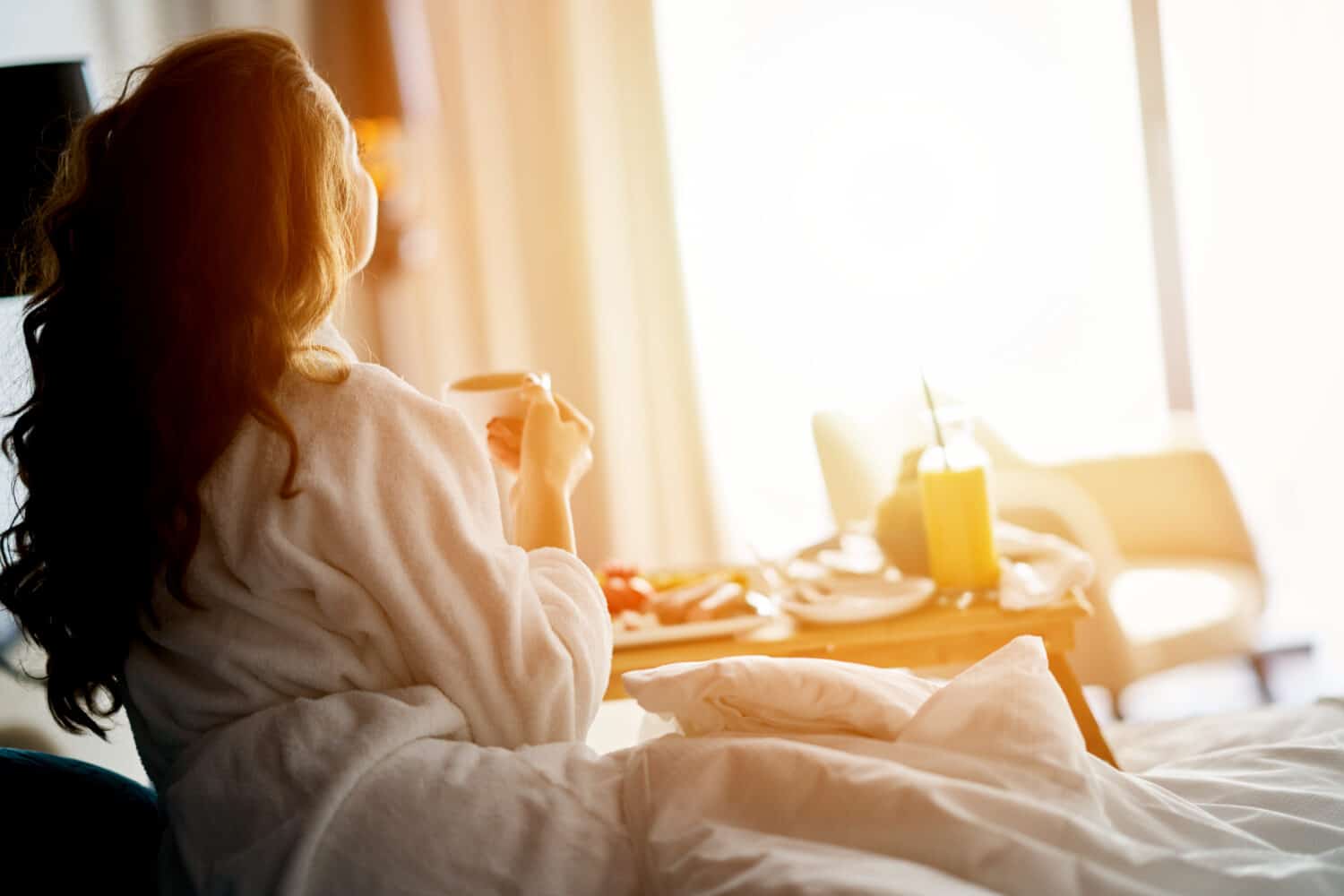 Breakfast in bed, cozy hotel room. concept