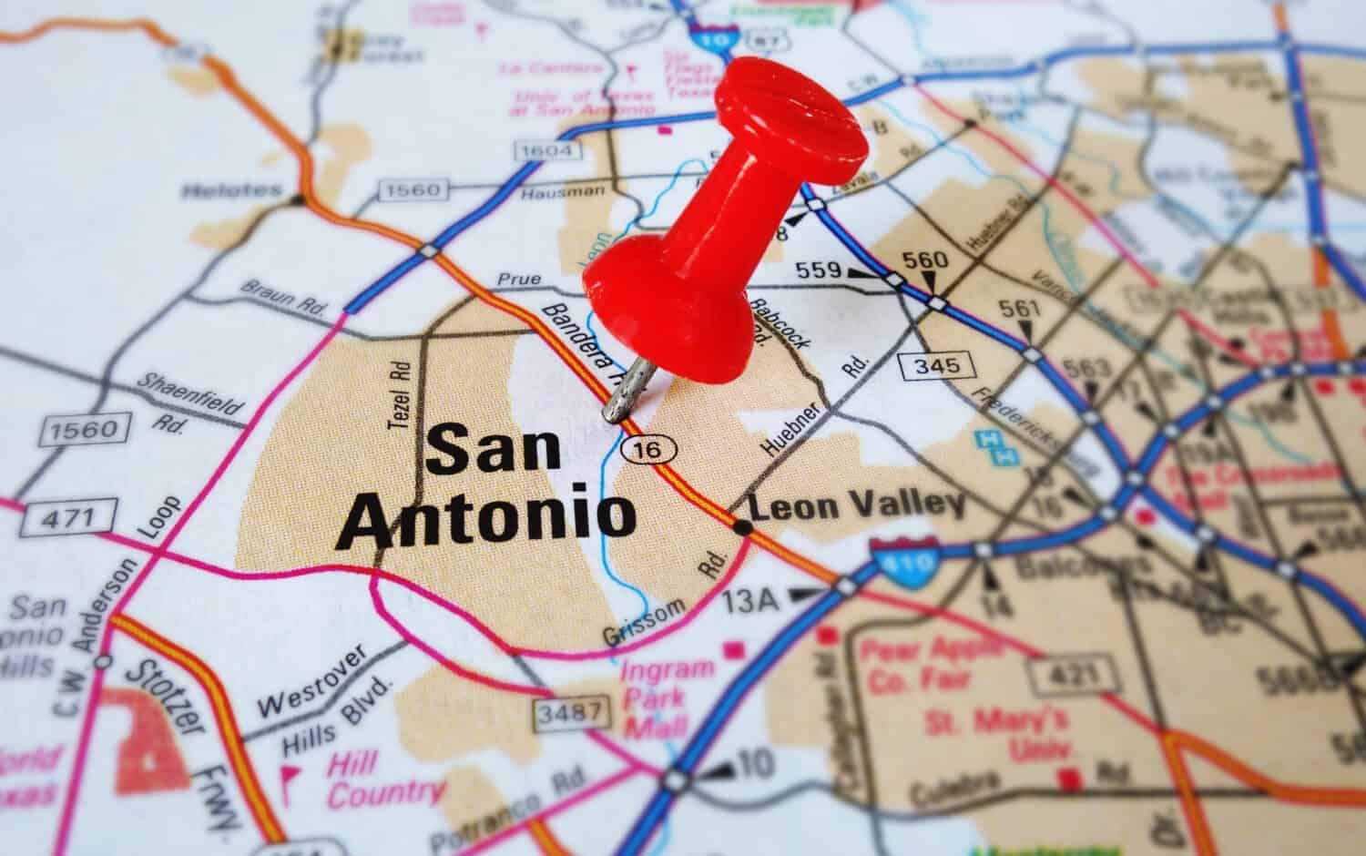 Closeup of a San Antonio map with tack                               