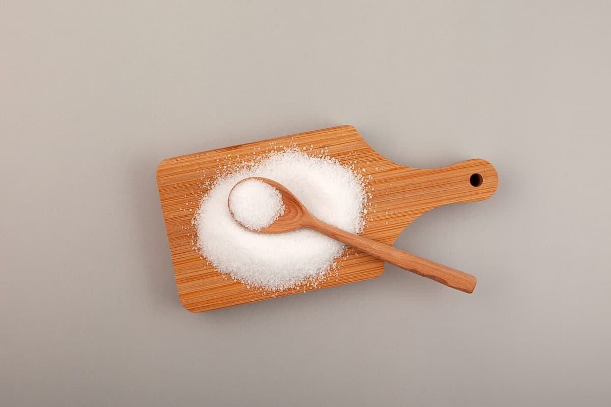 Erythritol, also called melon sugar on wooden board. Very popular sweetener. Food additive E968, sugar substitute. Fructose, Alternative sweetness, zero calorie.