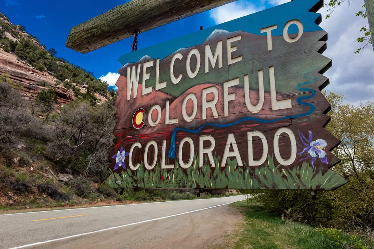 Welcome to Colorful Colorado State Road Sign near Utah/Colorado border going towards Norwood Colorado