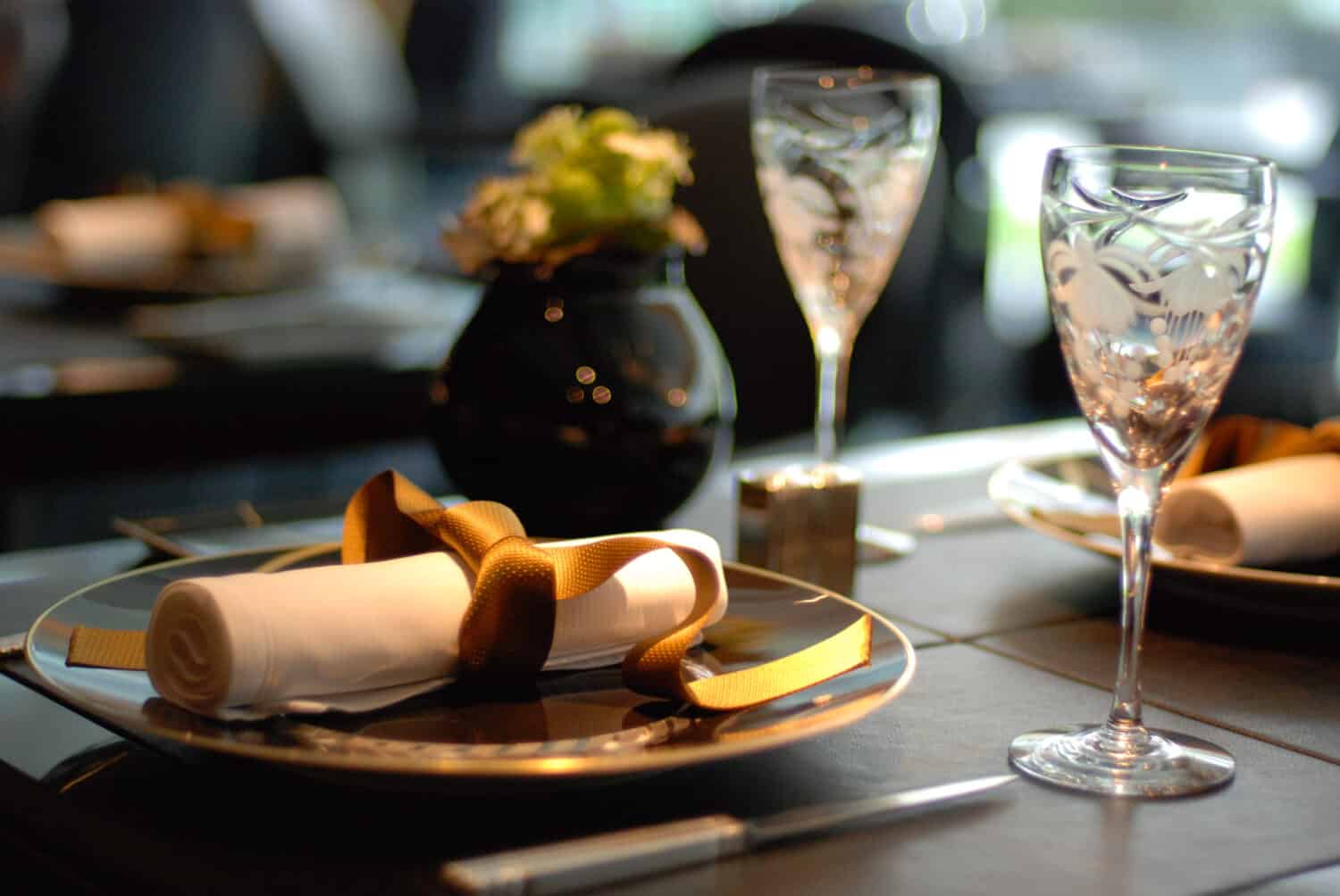 A very elegant and beautiful table setting at fine dinning restaurant.