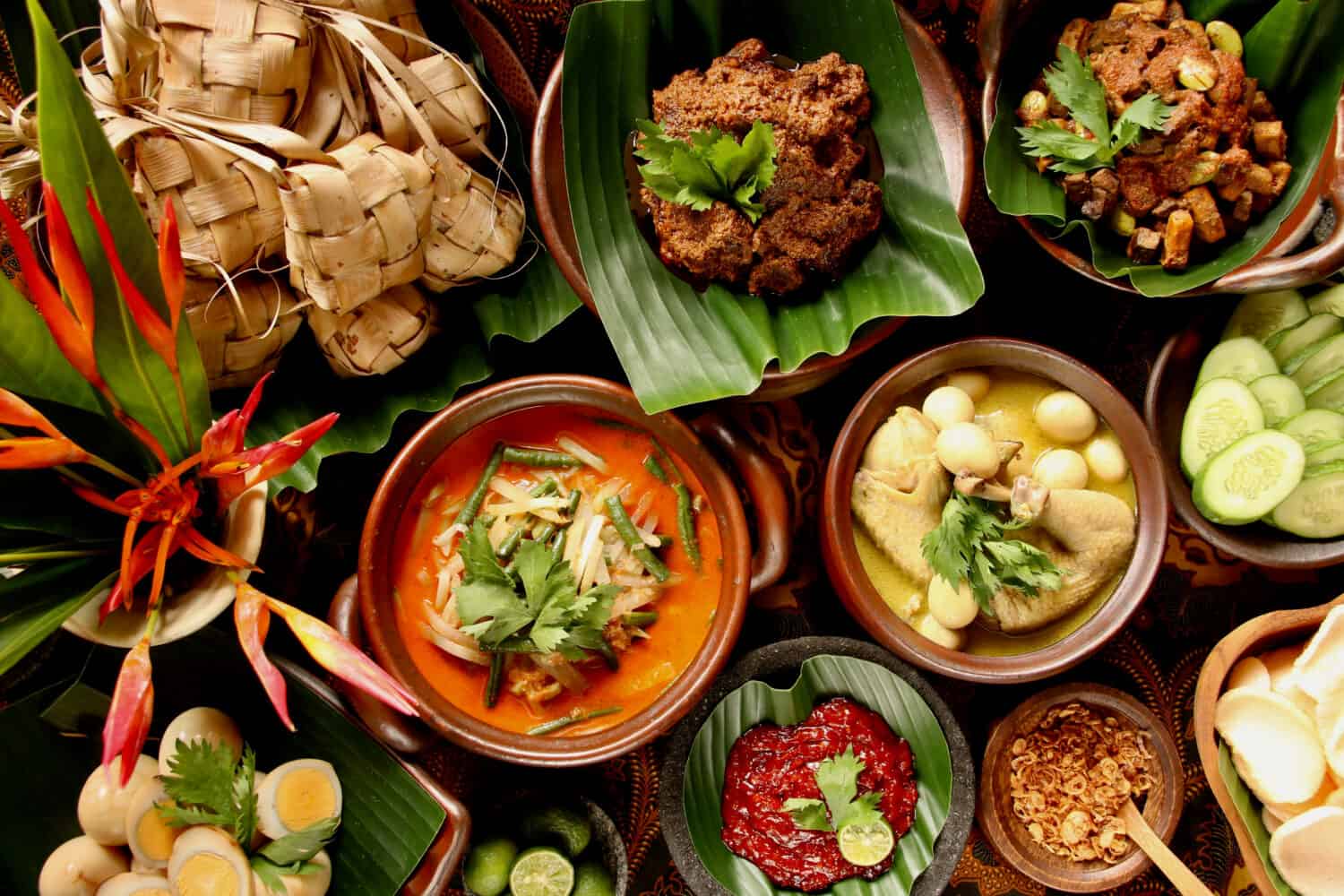 Ketupat Lebaran. Traditional celebratory dish of rice cake with several side dishes, popularly served during Eid celebrations.