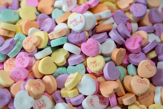 Pile of sweet candy hearts. Colorful treats.
