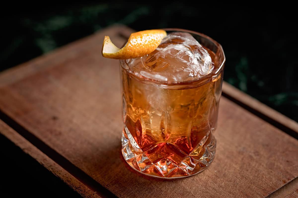 Old fashioned, classic cocktail served on the rocks
