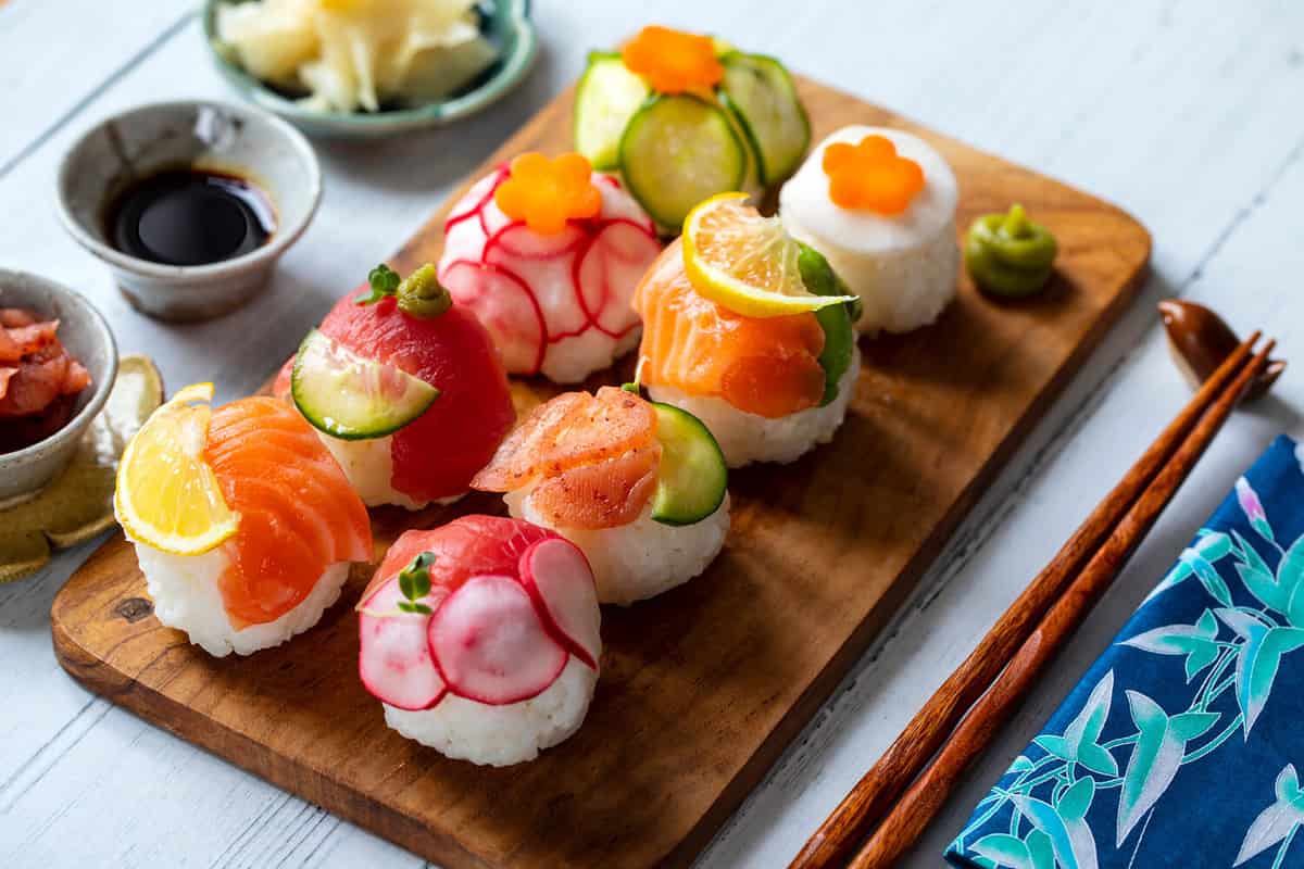 Temari sushi balls with salmon, tuna and vegetables