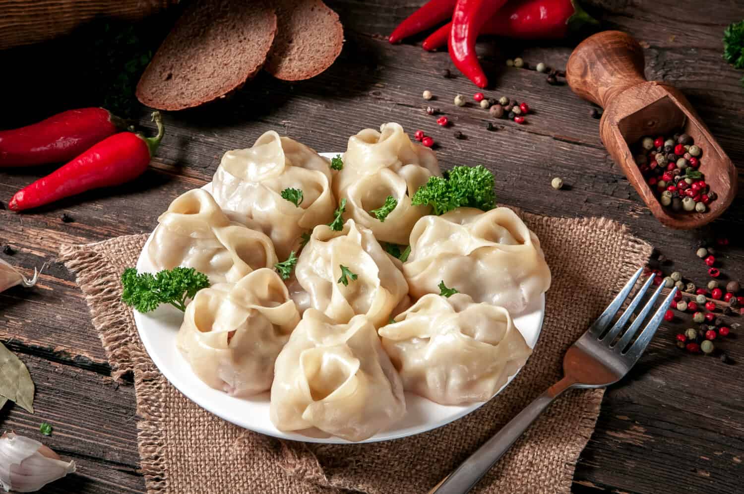 Stuffed dumplings, manti of dough and minced, close up