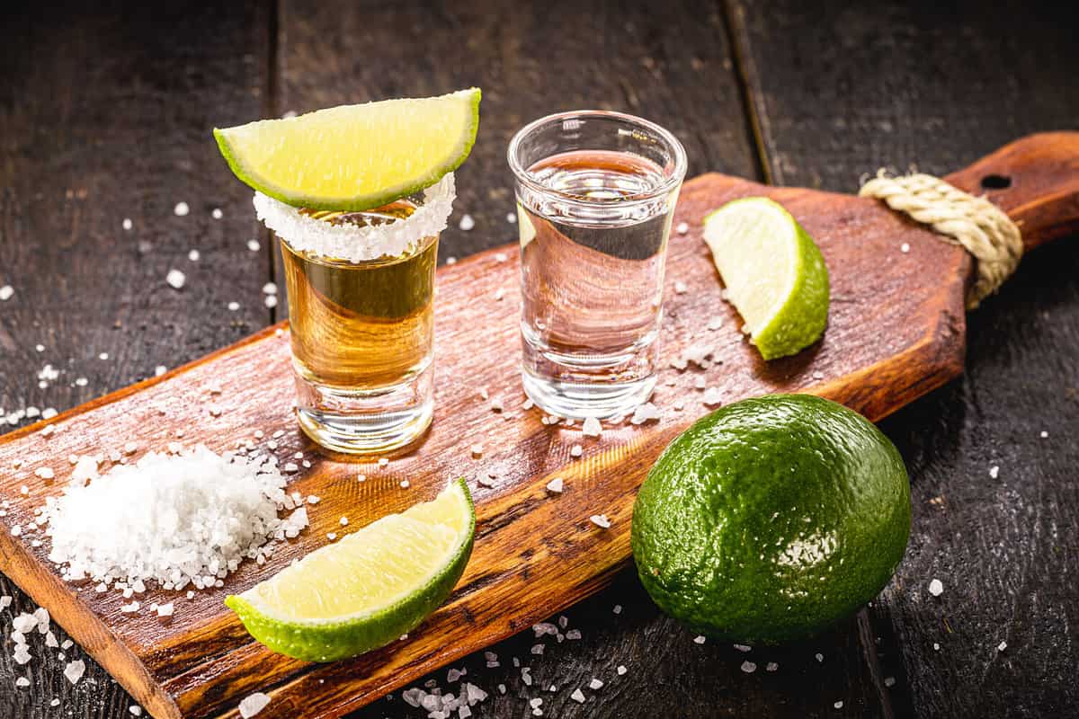 glasses of tequila, gold tequila and silver tequila, typical mexican drink