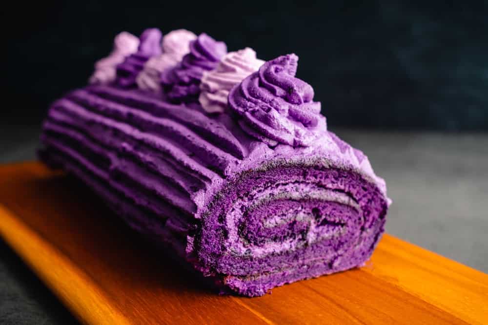 Ube Cake Roll with Whipped Cream Frosting: Roulade made with purple sweet potatoes and whipped cream icing