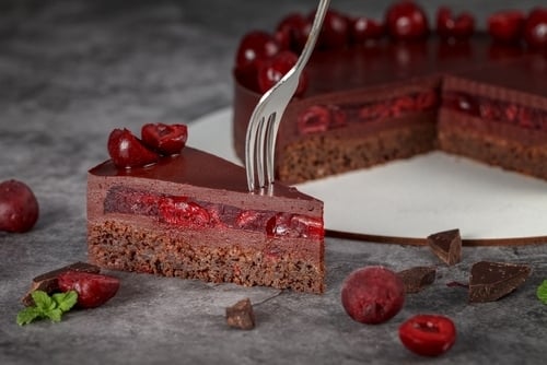 Chocolate cake with cherries. Delicious chocolate pie. Vegetarian gluten-free chocolate cherry cake