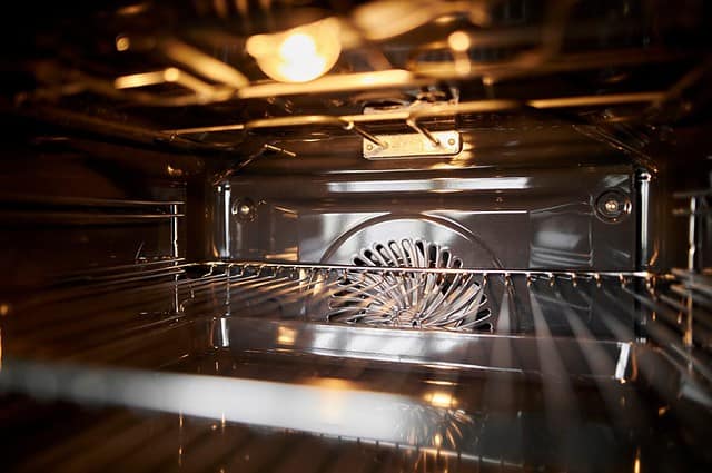 empty oven inside. Electric home kitchen oven open door slider panning shot. Oven. Convection inside stove. horizontal orientation photo