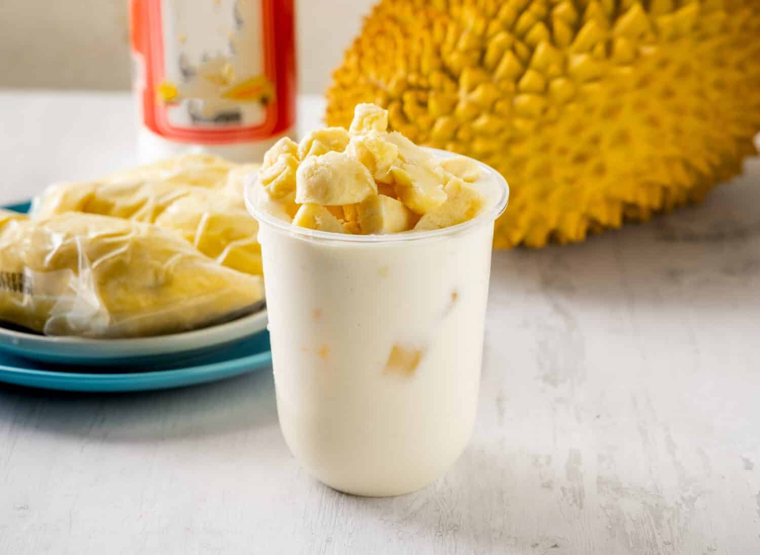 Fresh durian milk served in disposable glass isolated on background top view taiwan food