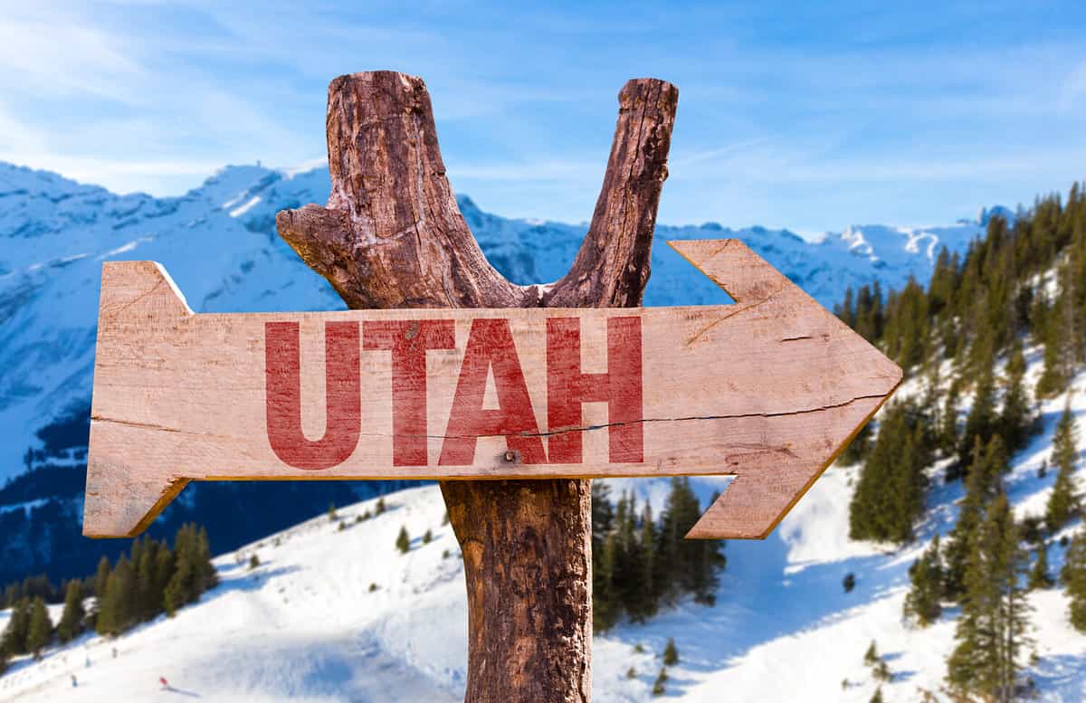Utah wooden sign with winter background