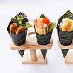 California Hand Roll Sushi Set : Foie Gras, Shrimp with Kani, Tamagoyaki, Avocado and Tobiko. Another is Shrimp Tempura and Crispy Tuna Skin with Sliced Cucumber.