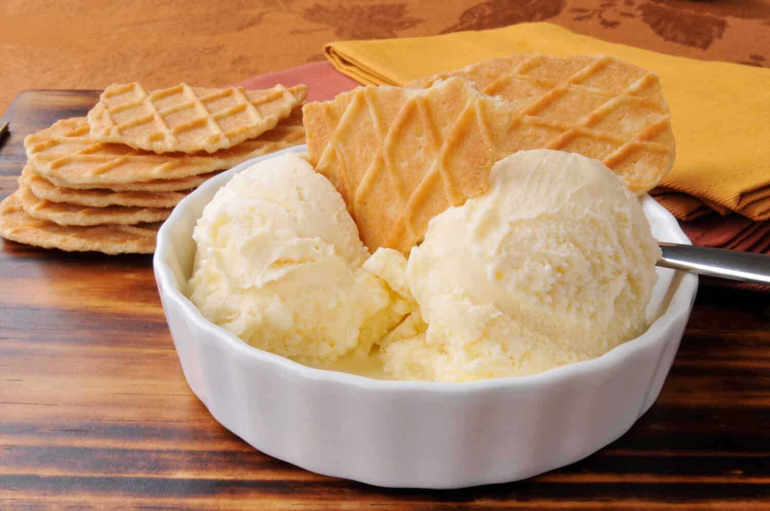 A bowl of French vanilla ice cream with gourmet caramel butter toffee wafers