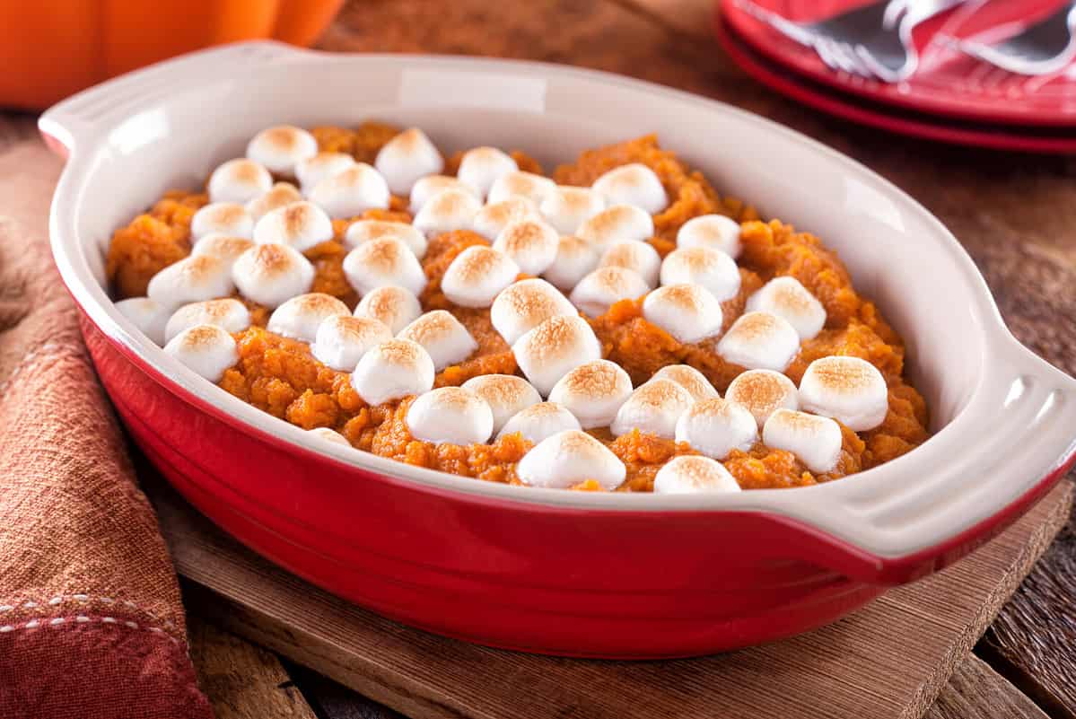 A delicious homemade sweet potato casserole with marshmallow topping.