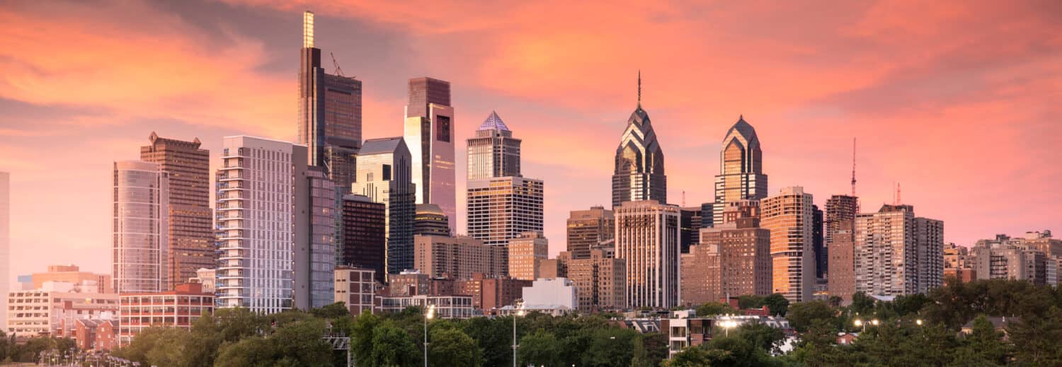 Downtown city skyline panoramic view of Philadelphia Pennsylvania USA over the Schuylkill River and boardwalk