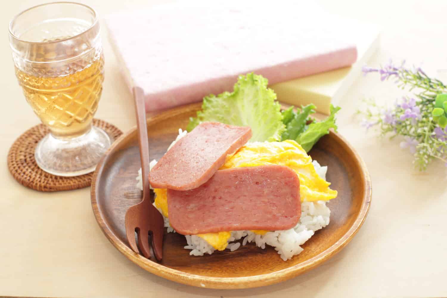 Asian food, pan fried luncheon meat and scrambled egg on rice